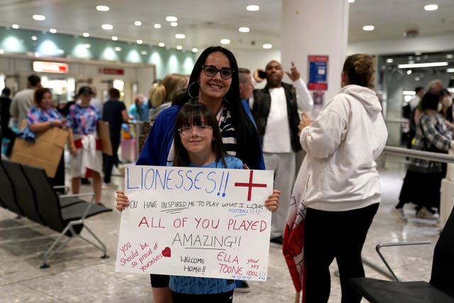 England fans await England's return at Heathrow