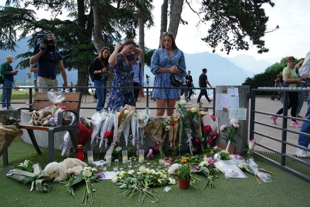 Tributes left near the scene at a lakeside park in Annecy, France, following a knife attack