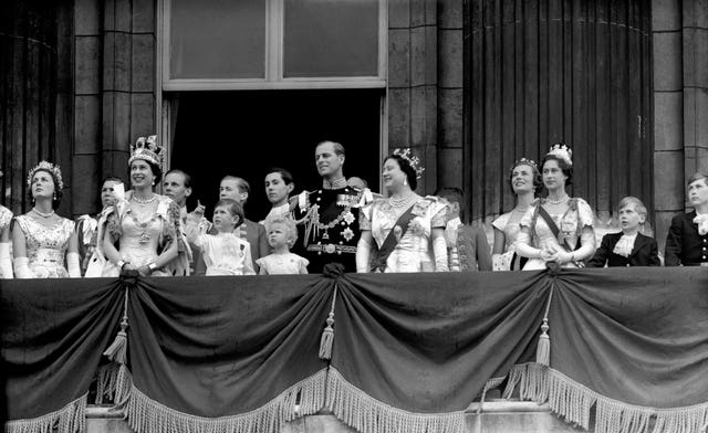 Prince Charles on the balcony of Buckingham Palace to view the fly past of the Royal Air Force after the Coronation of Queen Elizabeth II in 1953 (PA)
