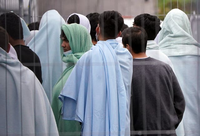 Migrants outside centre