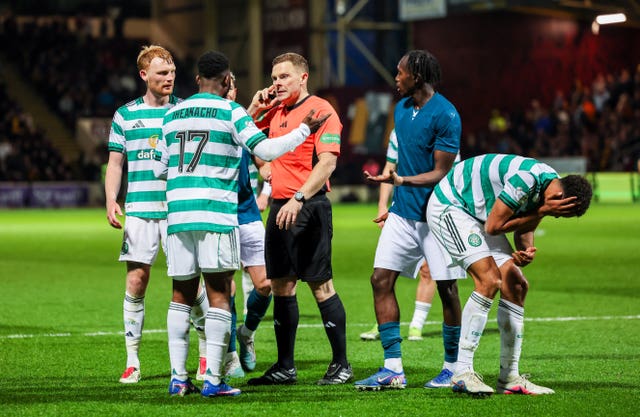 John Beaton in among Celtic and Mothewell players 