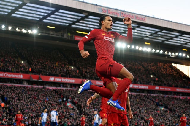 Virgil van Dijk was the unlikely goalscoring hero when Liverpool scraped past Brighton at Anfield. The Holland defender headed two first-half goals before the hosts were forced to hang on for a 2-1 victory following the dismissal of goalkeeper Alisson Becker