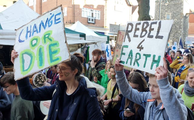 Students from the Youth Strike 4 Climate movement during a climate change protest on Canterbury high street in Kent