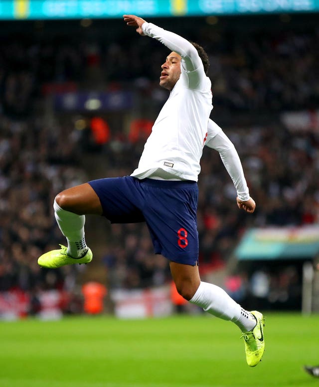 Alex Oxlade-Chamberlain celebrates scoring England's opener