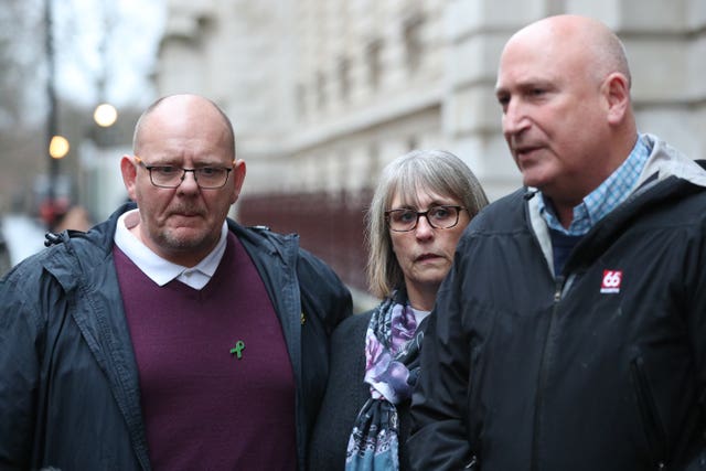 Tim Dunn with his wife Tracey and family spokesman Radd Seiger