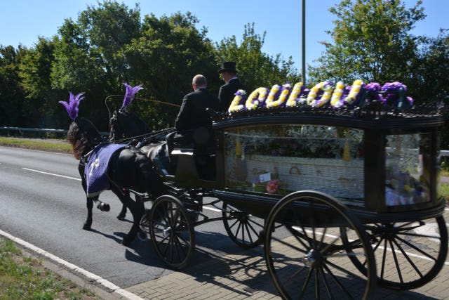 The horsedrawn carriage carrying the coffin of 16-year-old Louise Smith (Ben Mitchell/PA)