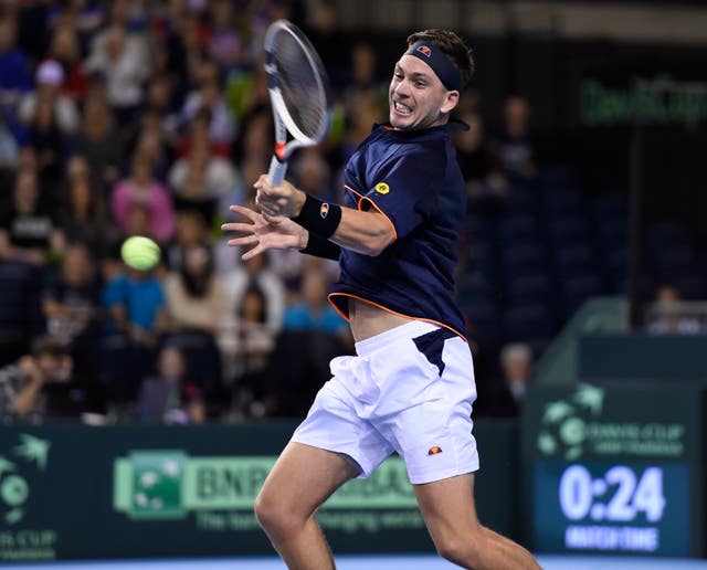 Great Britain’s Cameron Norrie fires a big forehand in the Davis Cup tie