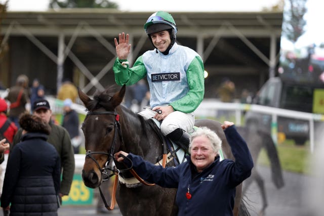 Gavin Sheehan celebrates winning The bet365 Mares’ Hurdle on You Wear It Well