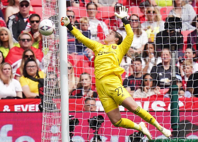 Manchester United goalkeeper Mary Earps makes a save 