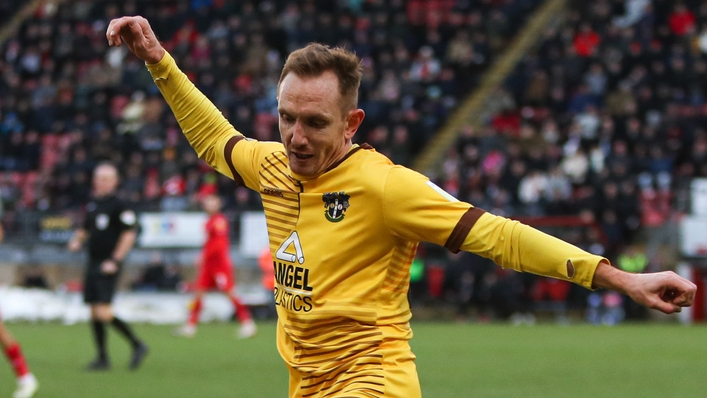 Rob Milsom sealed victory for Sutton from the spot (Kieran Cleeves/PA)
