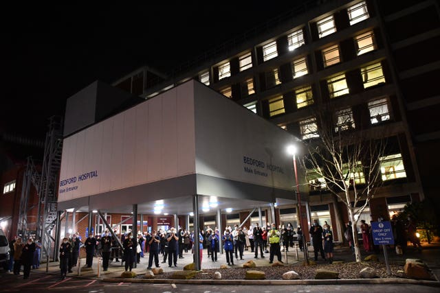 NHS staff outside Bedford Hospital join in with a nationwide clap in honour of Captain Sir Tom Moore 