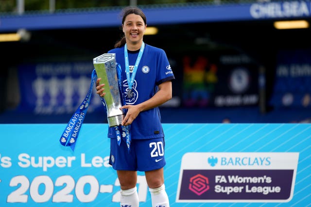 Chelsea forward Sam Kerr celebrates with the FA Women’s Super League trophy
