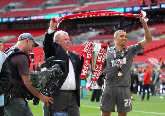 SSteve Evans salutes the Rotherham fans after his side's Wembley triumph