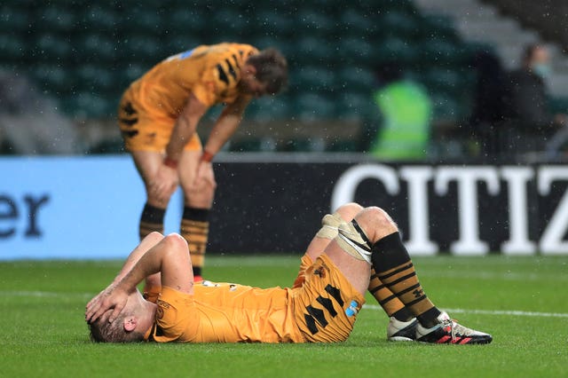 Wasps’ Joe Launchbury appears dejected with team-mates after the final whistle in October