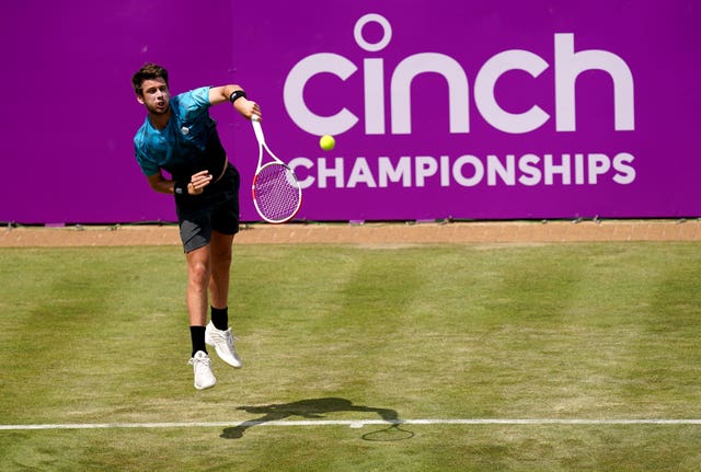 Cameron Norrie serves during his victory 