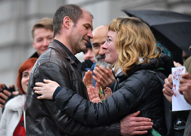 James Matthews is greeted by supporters as he arrives at the court (Dominic Lipinski/PA)