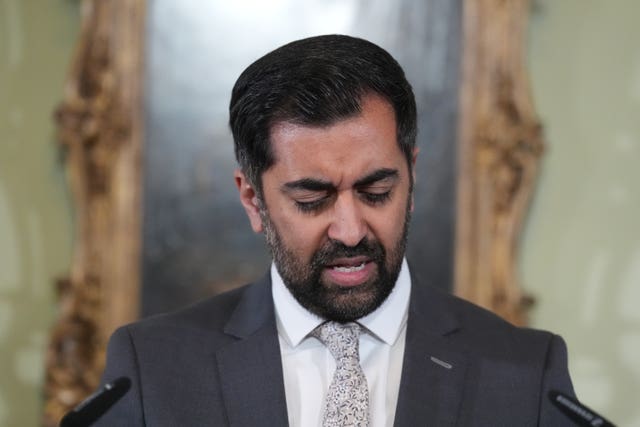 Humza Yousaf speaking with his head bowed