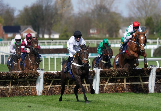 Constitution Hill ridden by Nico de Boinville (centre) on their way to winning the William Hill Aintree Hurdle 