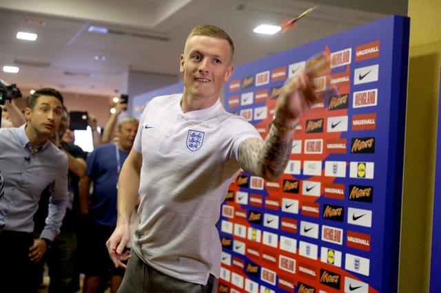 Jordan Pickford plays darts during the press conference at Repino Cronwell Park