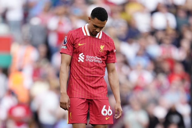 Liverpool defender Trent Alexander-Arnold bows his head