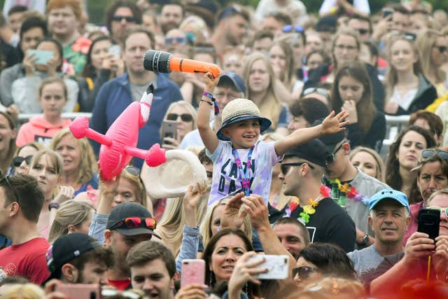 Crowds watch Rita Ora performing during the second day of BBC Radio 1’s Biggest Weekend at Singleton Park in Swansea (Ben Birchall/PA)