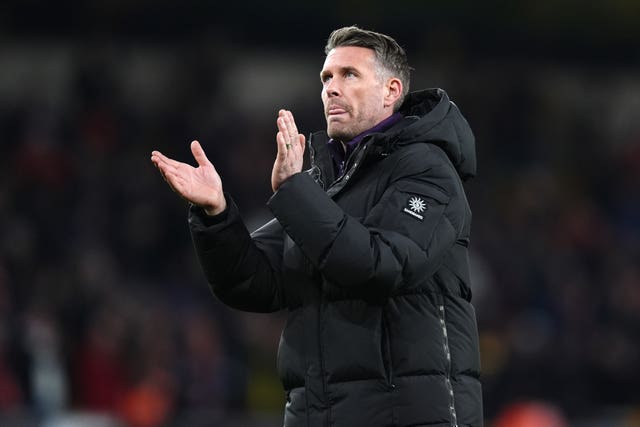 Wolves manager Rob Edwards applauds supporters