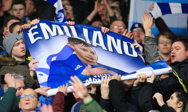 Fans in the stands hold up a tribute to the late Emiliano Sala during a Premier League match at St Mary’s Stadium, Southampton