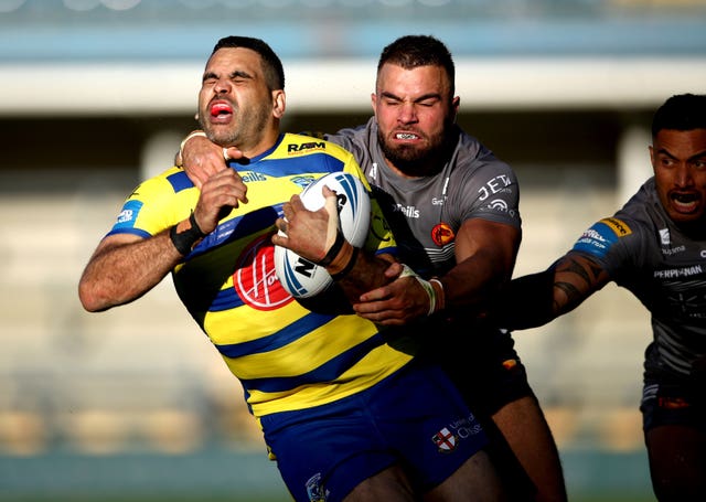 Greg Inglis, left, scored two tries in three appearances for Warrington