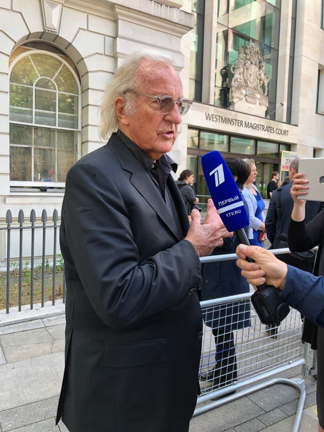 John Pilger outside Westminster Magistrates' Court 