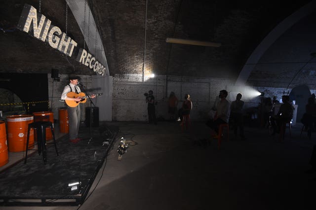 A performance during the press preview of One Night Records, the UK’s first socially-distanced immersive live music venue event at London Bridge, in London