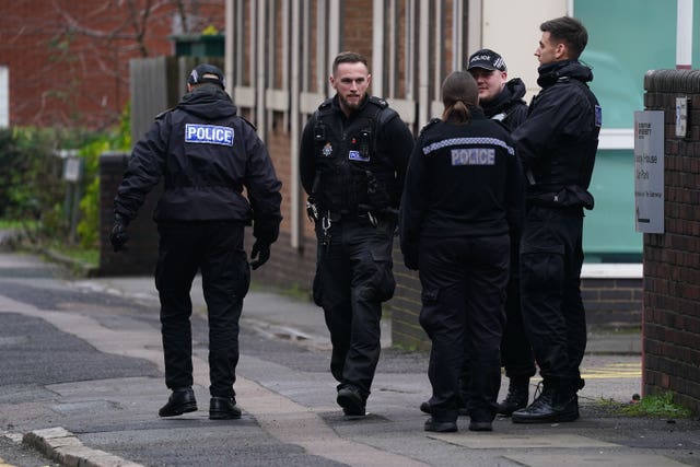 Police near the scene at the campus of De Montfort University