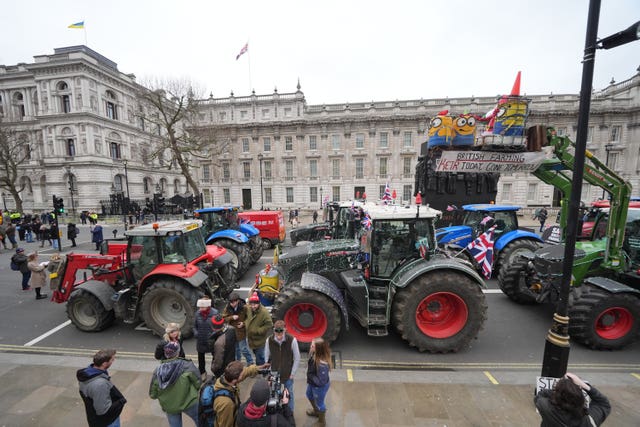 Tractors parked on Whitehall during a protest by farmers in Westminster