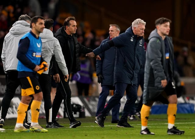 David Moyes, second right, shakes hands with Wolves manager Julen Lopetegui at the final whistle