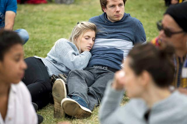 A woman takes a nap at Labour Live