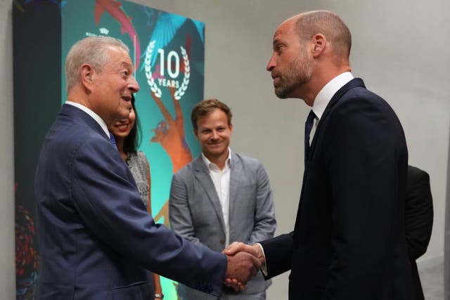 The Prince of Wales shakes hands with former US vice president Al Gore