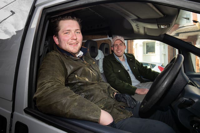 Mr Dean and Mr Bruce deliver pints of beer to locked down customers (Aaron Chown/PA)