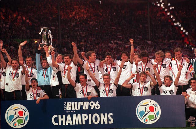 Germany celebrate with the Euro 96 trophy