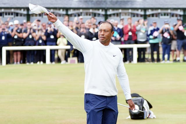 Tiger Woods acknowledges the crowd after finishing his round on day two of the 2022 Open at the St Andrews