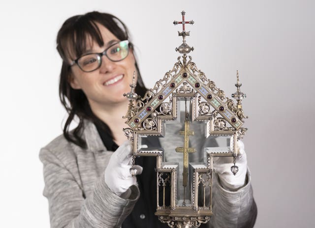 Special collections manager Dr Hannah Thomas with a True Cross relic