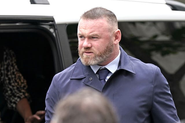 Wayne Rooney arrives at the Royal Courts of Justice