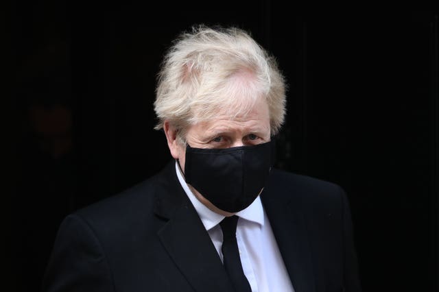 Prime Minister Boris Johnson emerging from Downing Street with a haircut after the easing of restrictions (Aaron Chown/PA)