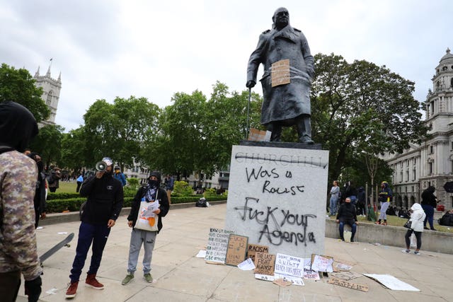 Graffiti on the Winston Churchill statue during a Black Lives Matter protest rally in 2000