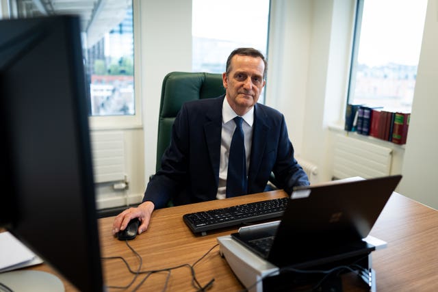 A man sitting at a desk