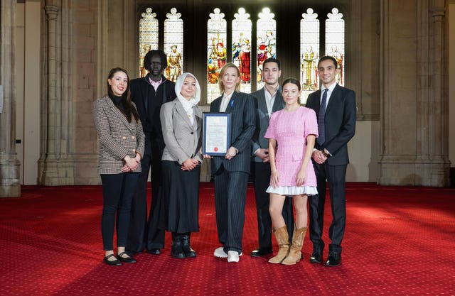 Cate Blanchett (centre) with guests (l to r) Hala Khankan from Syria, Duot Ajang from South Sudan, Maya Ghazal from Syria, Abdullah Sakhnini from Pakistan, Sofia Berdychevska from Ukraine and Anil Qasemi from Afghanistan after actress Cate Blanchett received the Freedom of the City of London