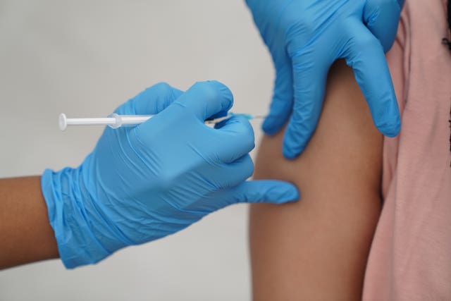 Woman receives Covid-19 vaccine