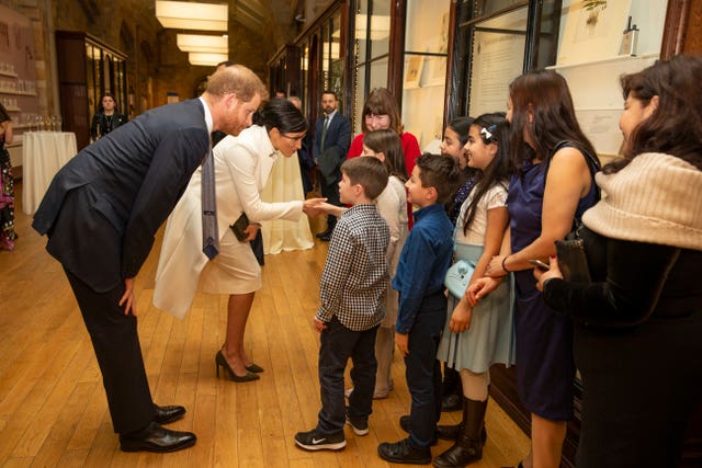 Harry and Meghan meeting with children from Urbanwise