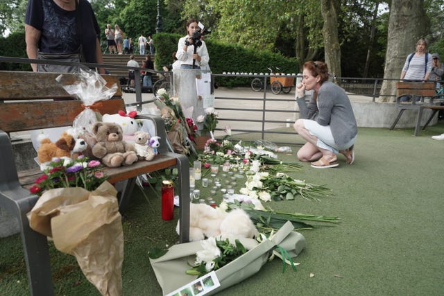 Tributes left near the scene in Annecy, France, following a knife attack 
