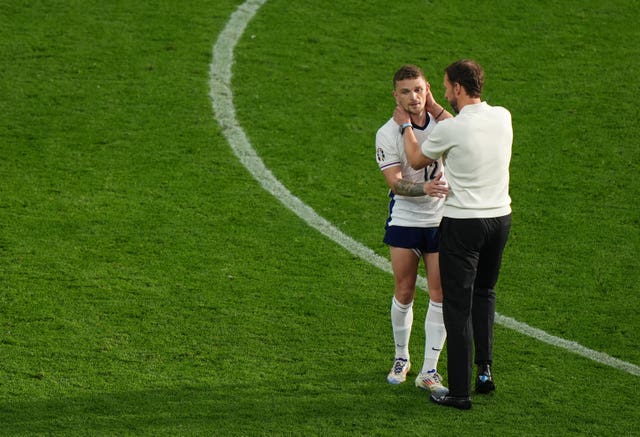 England manager Gareth Southgate embraces Kieran Trippier after the draw with Denmark
