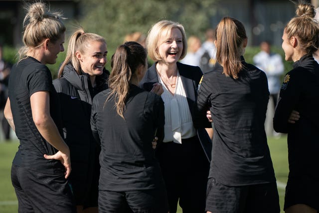 Prime Minister Liz Truss chats with members of the England women’s football team