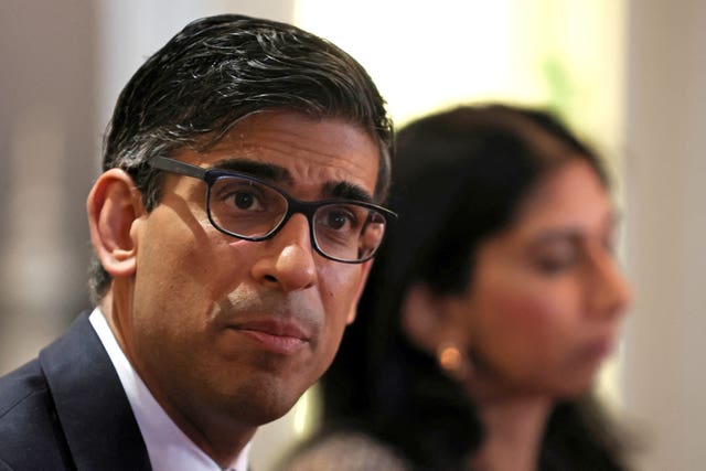 Prime Minister Rishi Sunak and Home Secretary Suella Braverman (Phil Noble/PA)